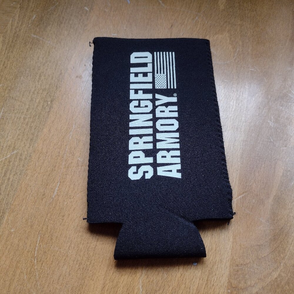 A "Springfield Armory" drink cozy